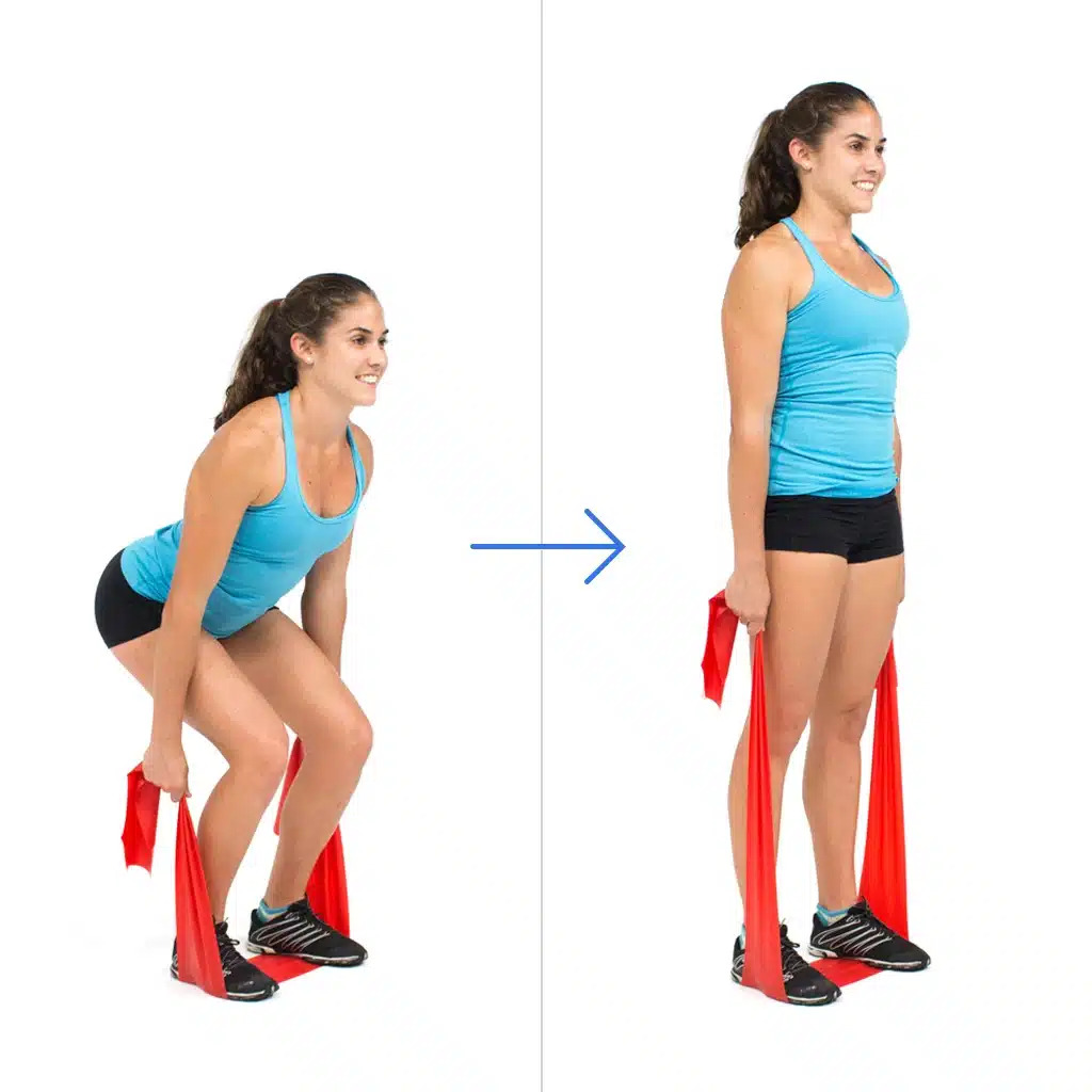 cô gái tập squat với dây kháng lực