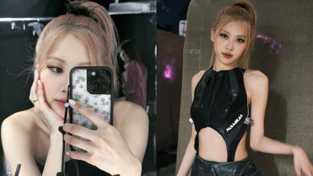 tóc dầu - Rose (BLACKPINK) mặc áo tank top đen, cột tóc đuôi ngựa cao và cầm điện thoại để selfie