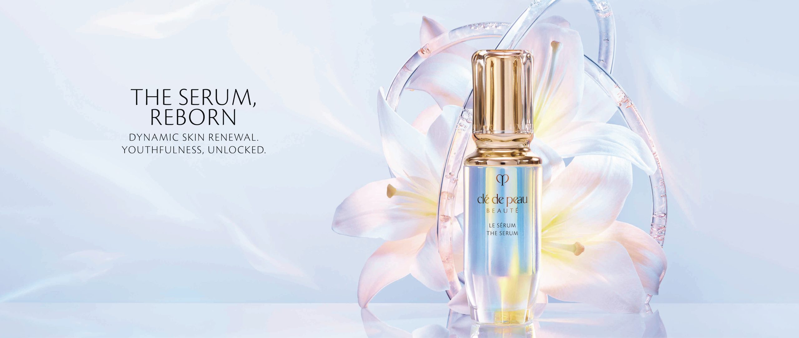 serum - chai serum màu hologram với nắp mạ vàng của thương hiệu Cle De Peau Beaute